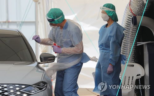 疫情下的韩国 酷暑高温中坚守岗位的医务人员